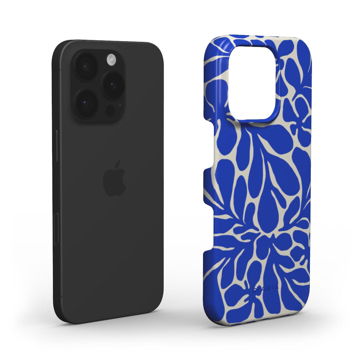 Black phone case next to a blue floral phone case on a white background
