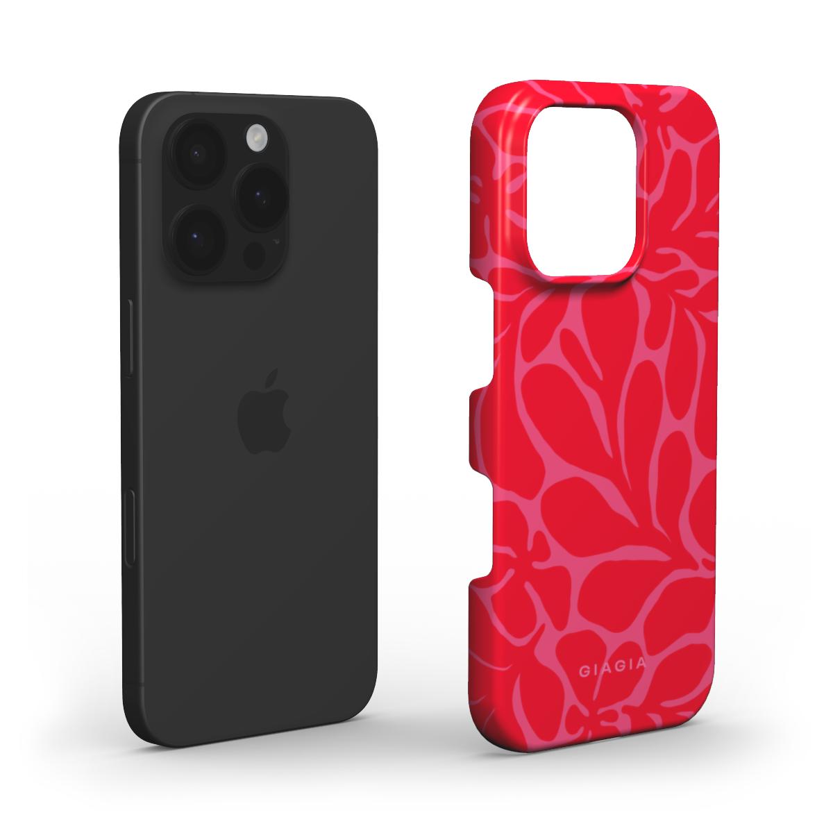 Black phone case and red patterned phone case on a white background