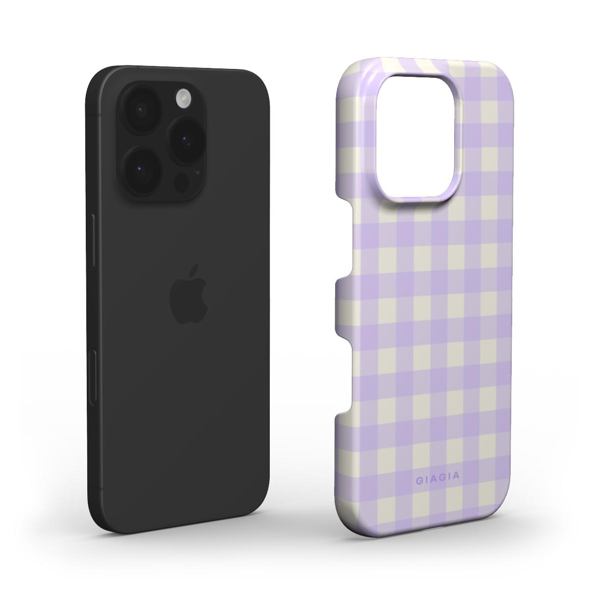 Black phone case and purple checkered phone case on a white background